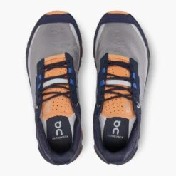 On Running Women's Cloudvista Trail Shoe - Midnight/Copper- Regular (B) 10 On Running Women's Cloudvista Trail Shoe - Midnight/Copper- Regular (B) -On Running Store 64.98592 cloudvista fw22 midnight copper w g2